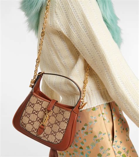 mini cartera gucci|gucci 1961 shoulder bag logo.